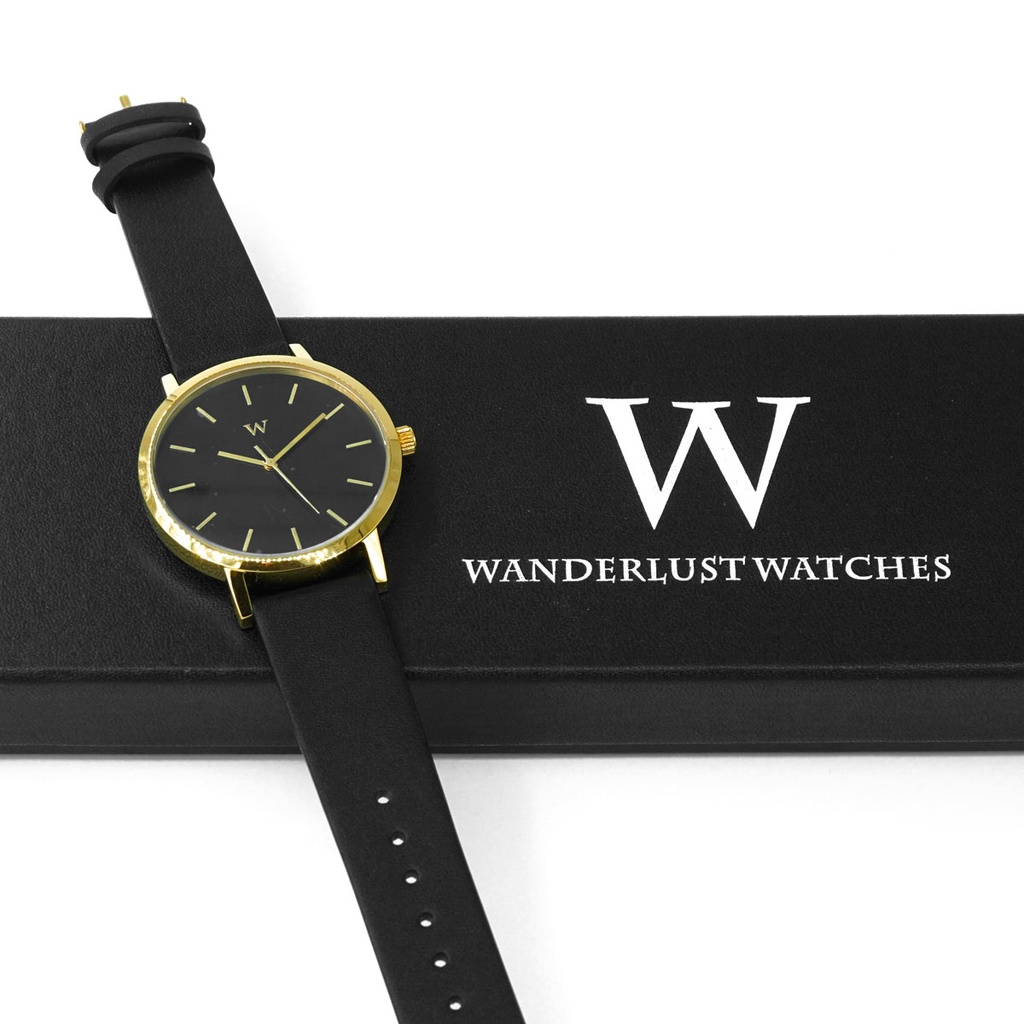 Reloj de Pulsera Wanderlust, Esfera Negra con correa negra y repuesto - Dorado